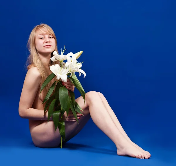 stock image Blonde girl with white lily