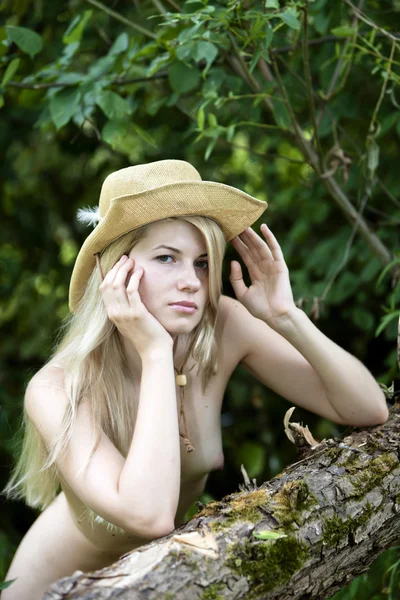 stock image Young sexy woman in a straw hat.