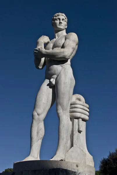 Statue of an athlete on a sunny day — Stock Photo, Image