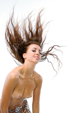 The girl topless with fluttering hair