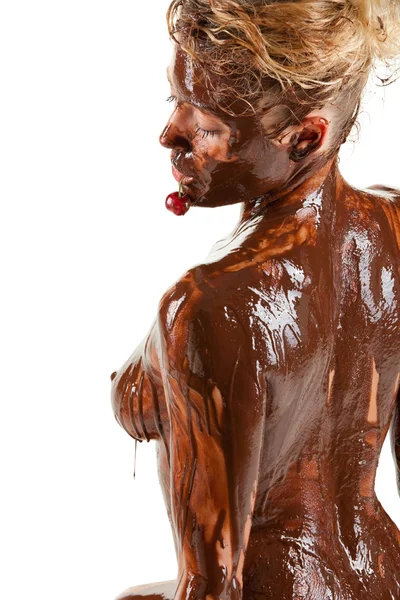 Stock image Naked blond girl eating chocolate